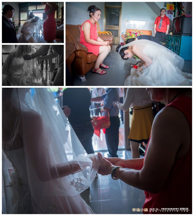 新娘的母親幫新娘蓋完頭紗,緊緊的牽的新娘的手